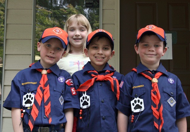 Kirkland Cub Scouts Troop 595 recently visited the Kirkland Reporter office to learn about the newspaper business. From left is Andrew Johnsen