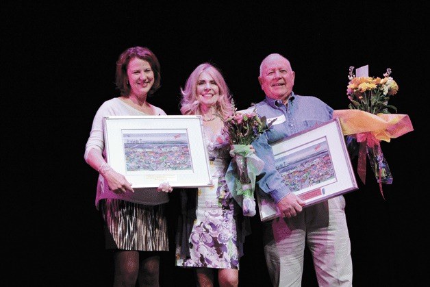 Kirkland Mayor Amy Walen stands with CACHET winner Kathy Feek and Santos Contreras