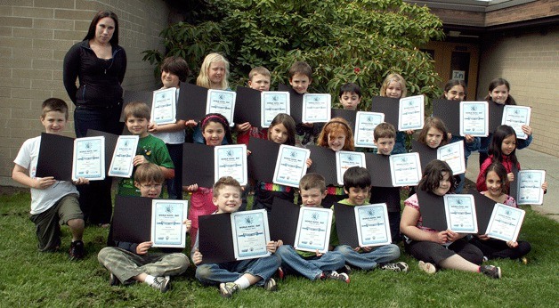 Carl Sandburg Elementary teacher Jennifer Via presented her 22 second graders with award certificates last week for placing No. 32 in the world for the World Math Day Event Hall of Fame.