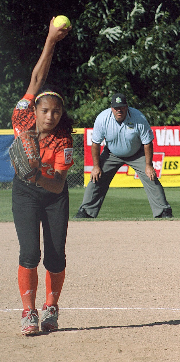 Philippines pitcher Alma Tauli delivers a strike to the plate during the semifinals of the Junior Softball World Series.