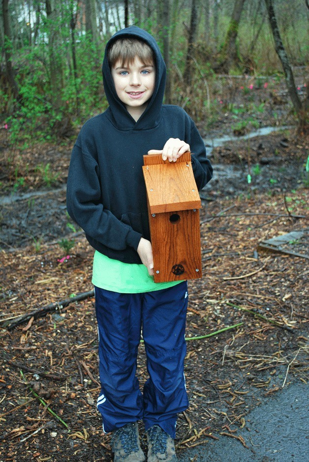 Cub Scout Nick Gerth built six bird houses for Cotton Hill Park. The houses are installed in this year’s UW restoration site at the south end of the park.