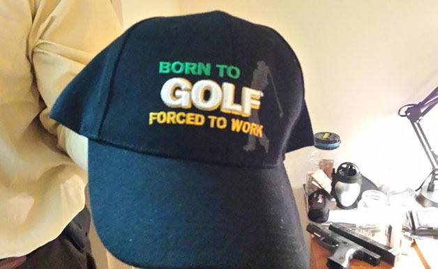 A golf cap seized by police during their search warrant on a Kirkland man's residence.