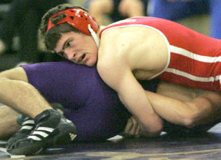 Juanita’s Matt Skurnic wrestles Lake Washington’s Jeffrey Kruse during the 33rd Annual Lake Washington Wrestling Tournament at Kirkland Junior High on Sat.