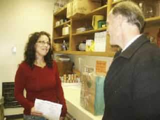 Peter Kirk Community Center site coordinator Joann Stark and Sen. Rodney Tom.