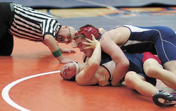 Derek Reubish works on a grip on an opponent during the Brian Hill Invitational at Eastside Catholic High School on Dec. 30. Reubish would go on to win the 160-weight class.