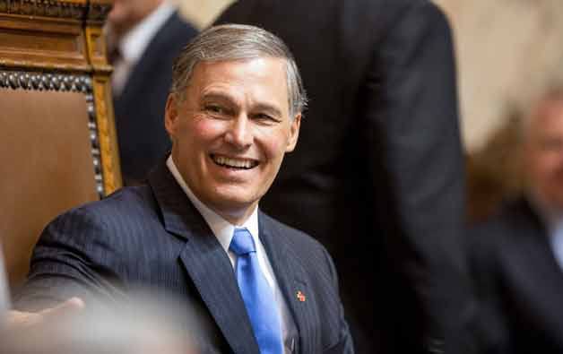 Governor Jay Inslee at the front of the rostrum on the House floor minutes before his Inaugural Address.