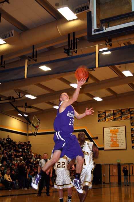 Lake Washington senior Sean Frankenfield goes hard to the basket