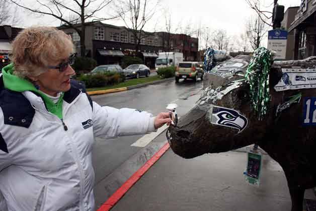 Terry Fletcher decided where to place the 'Super Bowl ring' on the Cow and Coyote statue in downtown Kirkland.