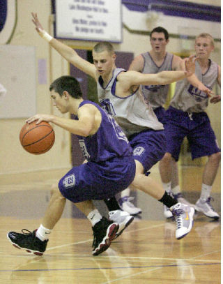 Lake Washington’s Spencer Wozeniak (No. 23) guards teammate Ryan Guisness (No. 23) during a team practice at Lake Washington High School on Wed.