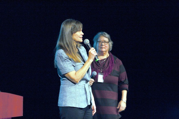 Public Works Director Kathy Brown answers a question during the open meeting at the Kirkland Performance Center Thursday night while Deputy City Manager Marilynne Beard looks on.