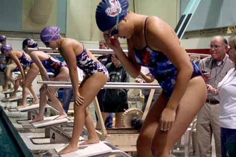 Swimmers from both Juanita and Lake Washington practice at Juanita pool every week but only face each other once during the season.