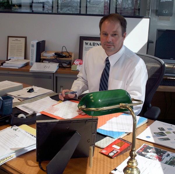 New City Manager Kurt Triplett at his desk in Kirkland City Hall.