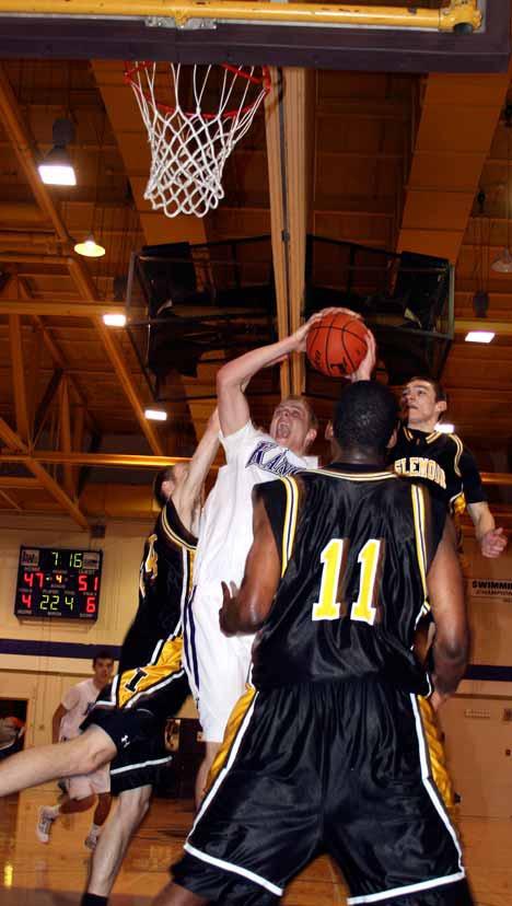 Lake Washington senior Ryan Guisness takes on three defenders as he drives to the basket for two of his game high 20 points Friday night.