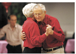 Al and Virginia Carlson of Kirkland dance at North Bellevue Community Center’s Sweetheart Dance on Feb. 10. The pair met at Northshore Senior Center two years after losing their spouses to Parkinson’s disease only one month apart. They have been married eight years. FUMIKO YARITA