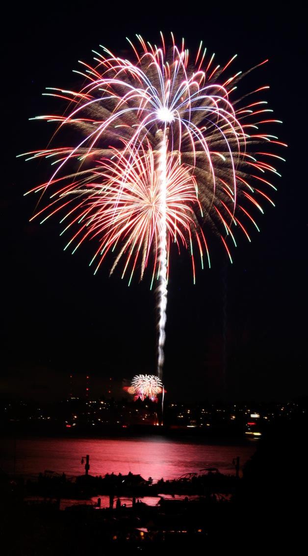 Brilliant fireworks ignite over Lake Washington during the Fourth of July celebration in Kirkland. But some local residents had fireworks shows of their own