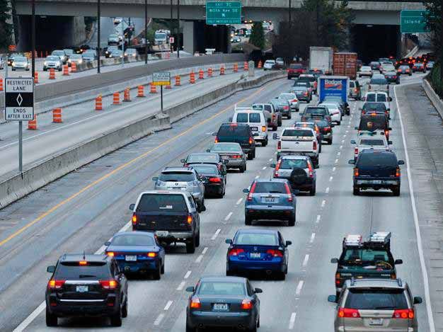 Traffic slows on Interstate 90 westbound across Mercer Island during the morning commute on Jan. 3.