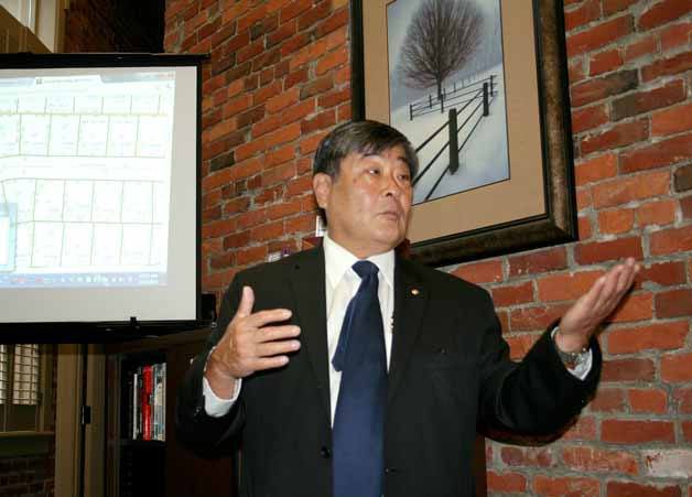 King County Assessor Lloyd Hara speaks to Windermere real estate agents in downtown Kirkland on Feb. 21.