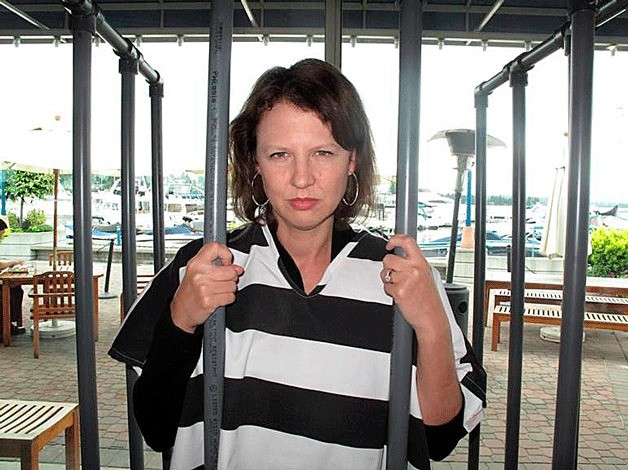 City Councilmember and Ford of Kirkland CFO Amy Walen 'behind bars' for the MDA Lockup event at the Woodmark Hotel June 17. Walen raised her full 'bail