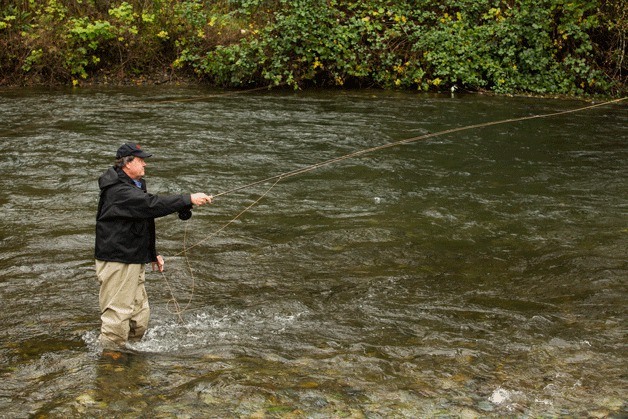 Bruce Farr demonstrates fly fishing.