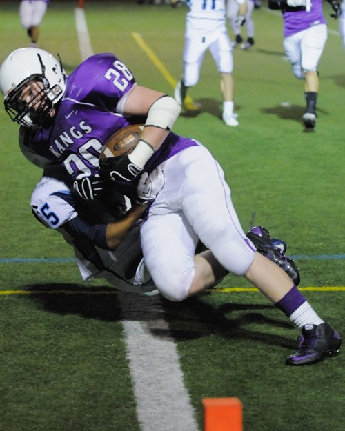 Kangs RB Gavin Santjer-Goetz (28) crosses the goal line for a second half touchdown against the visiting Interlake Saints on Friday.