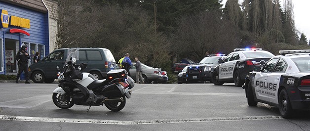 Kirkland Police apprehend a suspect in the parking lot of the Napa Auto Parts Store on Slater Avenue Northeast following a brief highway pursuit.