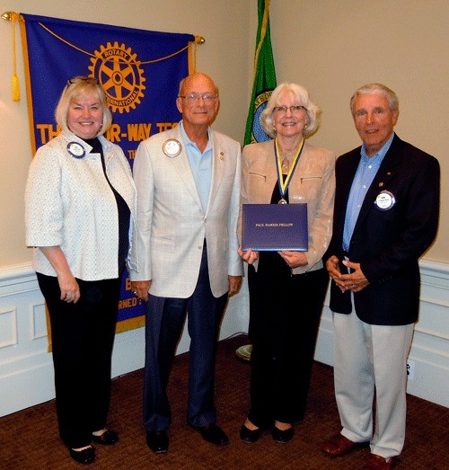 Kirkland Rotary Club President Pat Dye (left)