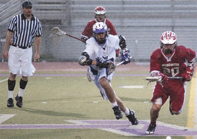 A Lake Washington lacrosse player sprints towards the ball during the Kangs 10-9 win over Snohomish during the division II boys lacrosse state quarterfinals.