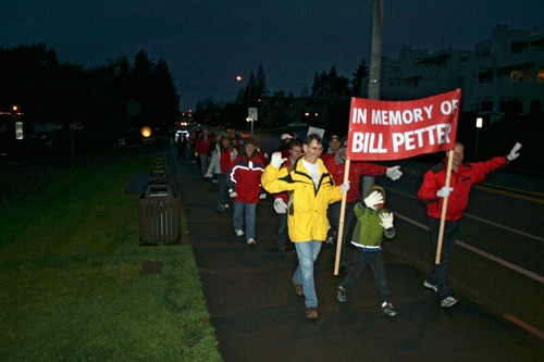 More than 150 people turned out to honor Kirkland resident and volunteer Bill Petter for a walk down Lake Washington Boulevard at 6 a.m. Friday morning.