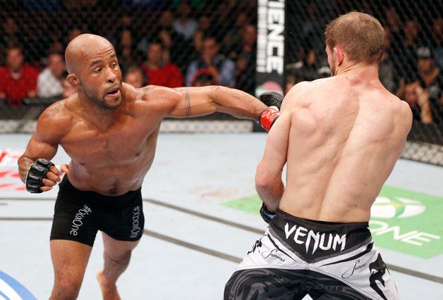 Kirkland’s Demetrious Johnson fights Ali Bagautinov during the Flyweight Championship bout at UFC 174 in Vancouver
