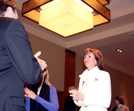 King County executive candidate Susan Hutchison speaks with campaign supporters during an election night gathering at the Hyatt Regency in Bellevue Nov. 3.