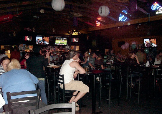 Patrons enjoy the night life at Suede Bar in the Kingsgate neighborhood on a recent Saturday night. The bar is at the center of a noise dispute with neighboring residents.