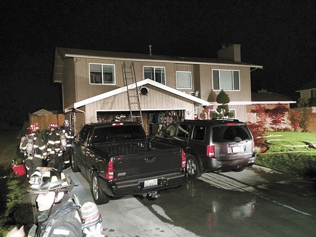 Kirkland firefighters responded to a garage fire in the North Juanita neighborhood Sunday night.