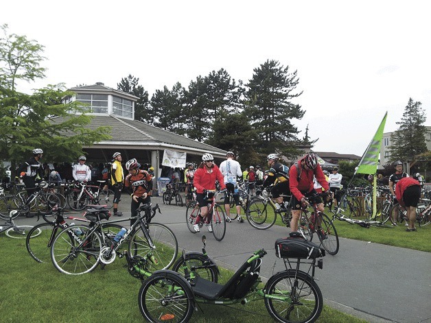 Bicyclists register and prepare for the ride at the 7 Hills of Kirkland during the 2013 event.