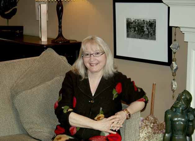 Kirkland Mayor Joan McBride sits on her living room couch at her home in the Moss Bay neighborhood. McBride has spent more than a decade on the Kirkland City Council but will not seek reelection in the fall.