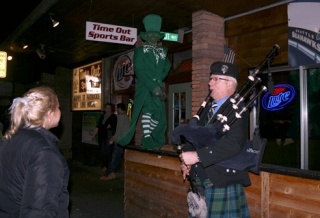 Bagpiper Neil Hubbard and Mark Schuster