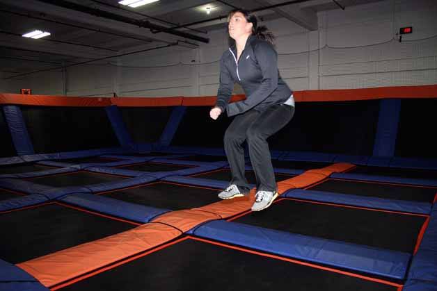 Sky Mania instructor Abigail Aikins demonstrates some moves in the new Skyrobics class