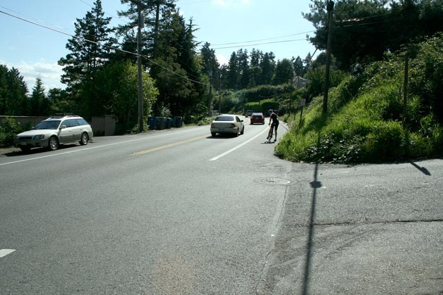 The section of Juanita Drive where John Przychodzen died in July is heavily used by bicyclists and is marked by a wide bike lane along the shoulder and a sweeping turn above Lake Washington.