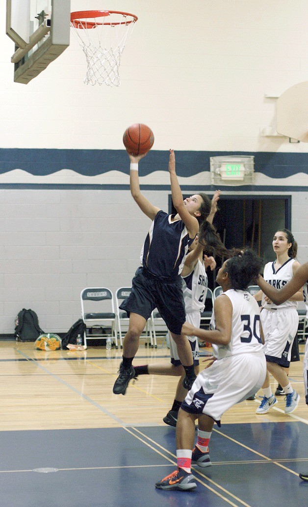 Providence guard and captain Reyna Lacalli goes for a layup.