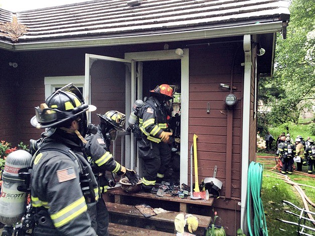 Firefighters respond to a kitchen fire on Finn Hill on Friday morning.