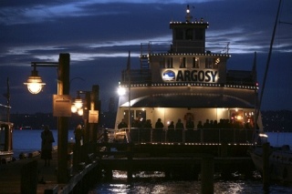 Guests wait in line to check-in on board the Argosy MV Kirkland during the Kirkland Downtown Association’s Annual Fall Ball and Flowerpot Fundraiser on Oct. 11