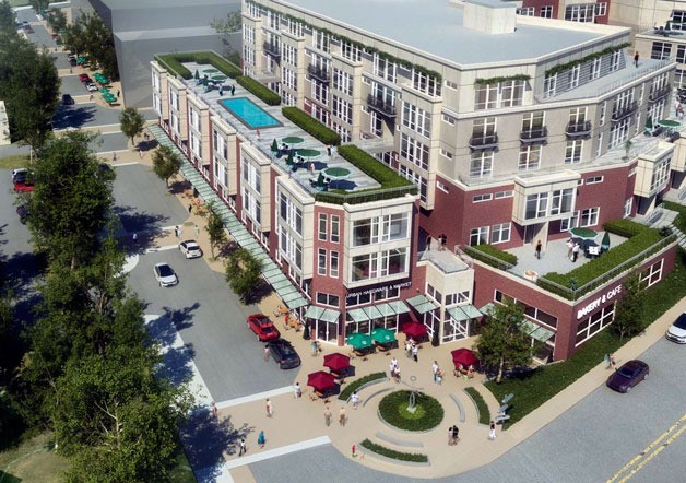 This artist’s rendering shows the vision laid out by MRM Capital for the building next to Parkplace in downtown. The city is considering MRM’s request to change the zoning from office to mixed-use.