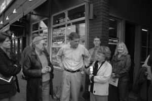 Social marketing consultant Nancy Lee (second from right) shares results of Kirkland’s pedestrian flag study with Seattle City Councilwomen Sally Clark and Jan Drago (from far left) as David Godfrey of Kirkland Public Works (middle) and Kirkland Deputy Mayor Joan McBride (far right) look on outside the Epicurean Edge on Central Way. McBride was giving Drago and Clark a tour of Kirkland’s sidewalks last Friday to demonstrate the city’s pedestrian safety initiatives. The Seattle Council is now working on a number of activities related to pedestrian safety.
