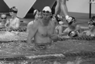 Olympic gold medalist Josh Davis keeps a close eye on swimmers during the recent WAVE Aquatics Breakout! clinic at the Juanita High School pool.