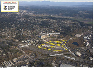 Aerial photo of the two-staged Totem Lake Malls development site. Work on the first phase (the bottom circled “site”) could start later this year and be completed by 2010.