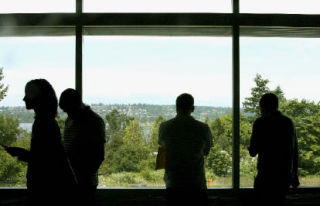 Visitors take in the view of Lake Washington from the new 195