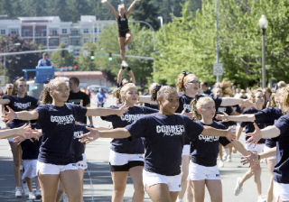 Members of the Connect All Stars march in the Derby Days Parade in downtown Redmond on July 12.