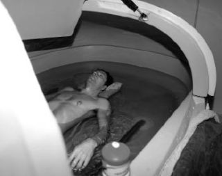 Brian Bales in his float tank at home.