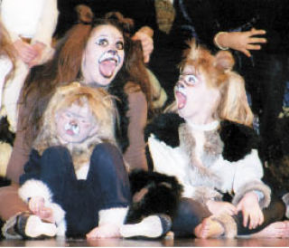 Young performers in Bellevue Youth Theatre’s upcoming production of “Jungle Book” roar for the camera during a rehearsal. The play