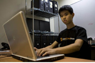 Ed Jiang found his love for computers helped him get a job at Bellevue’s VoiceBox Technologies.