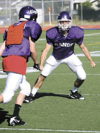 Lake Washington’s Matt Hanson works out with the team during football practice.
